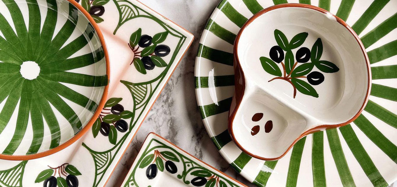Handmade Portuguese ceramics from Casa Cubista's Olives Collection, featuring a hand-painted olives design, celebrating the fusion of traditional craftsmanship and contemporary aesthetics.