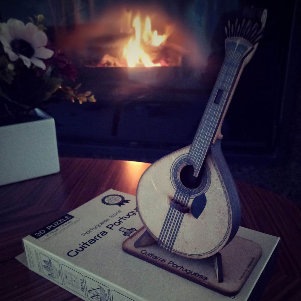 3D Puzzle Portuguese Icons displayed on a coffee table with a fireplace on the background.