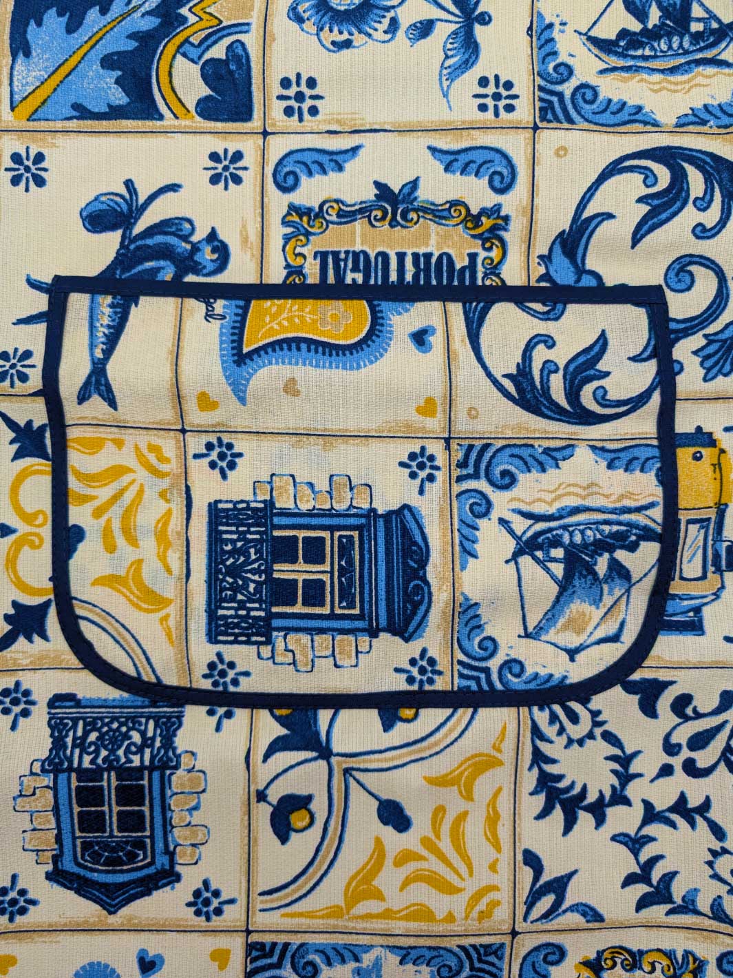Decorative tiles with blue and yellow patterns on a beige background