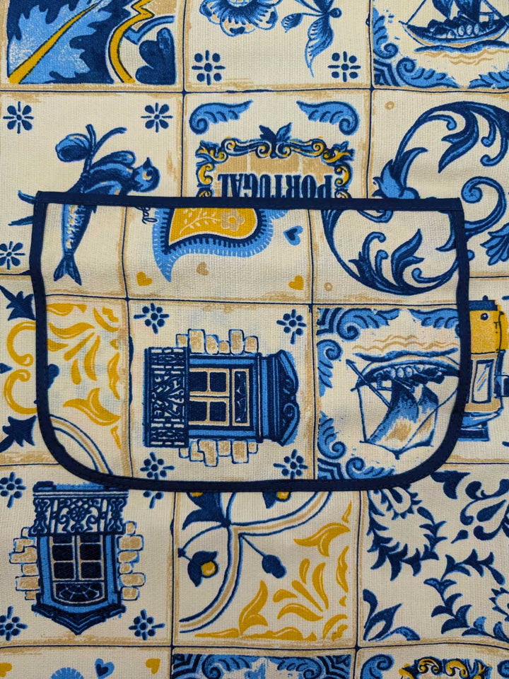 Decorative tiles with blue and yellow patterns on a beige background