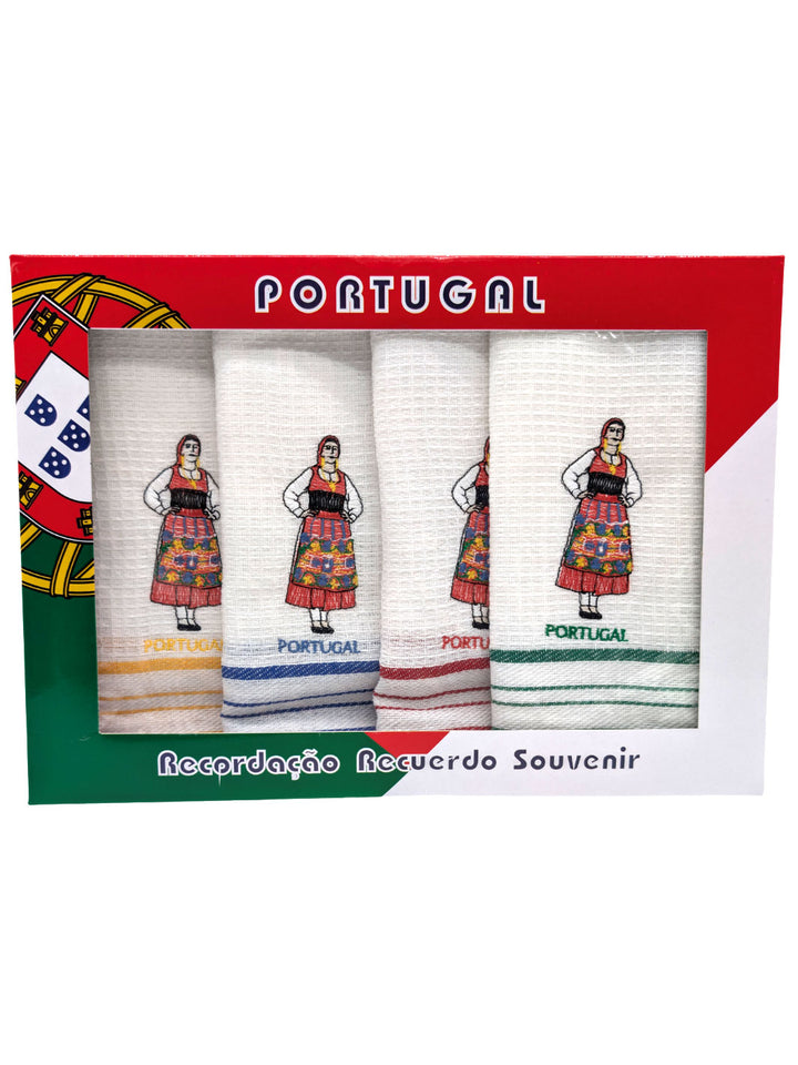 Set of four white towels withPortuguese traditional design in a box with 'Portugal' text.