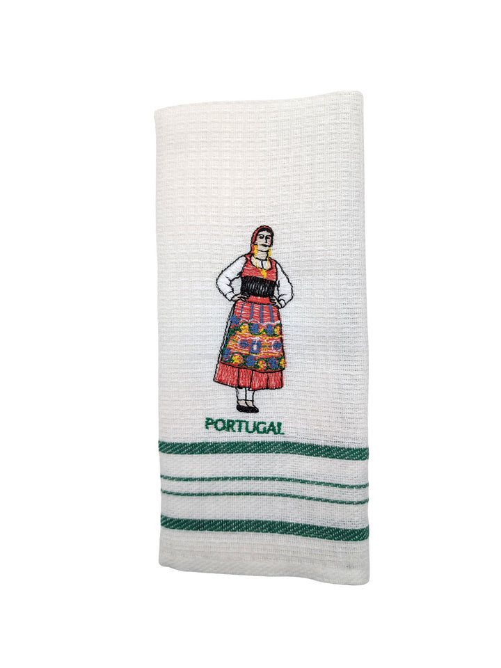 White towel with embroidered design of a person in traditional attire and 'Portugal' text on a white background