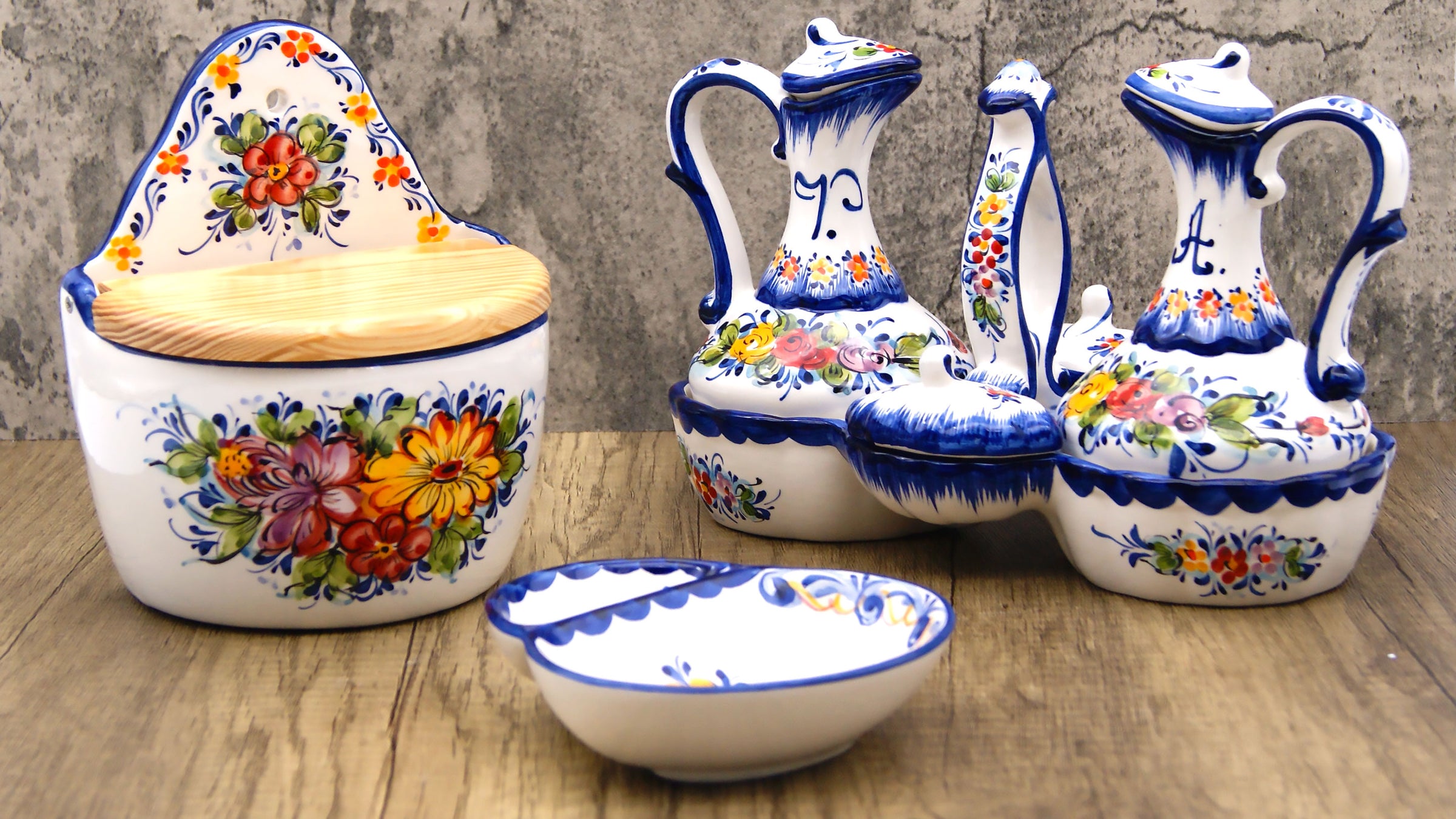 Hand painted traditional Portuguese ceramic salt holder, olive dish and cruet set.