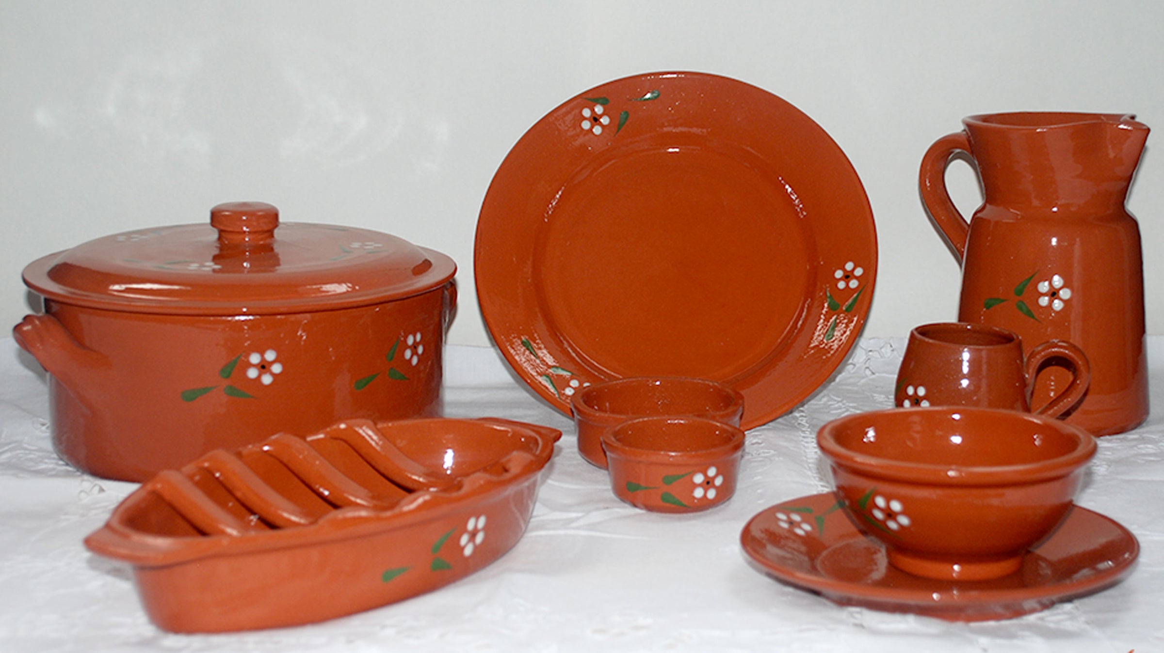 Handmade and hand painted PORTUGUESE POTTERY TERRACOTTA GLAZED CLAY cookware and servingware.