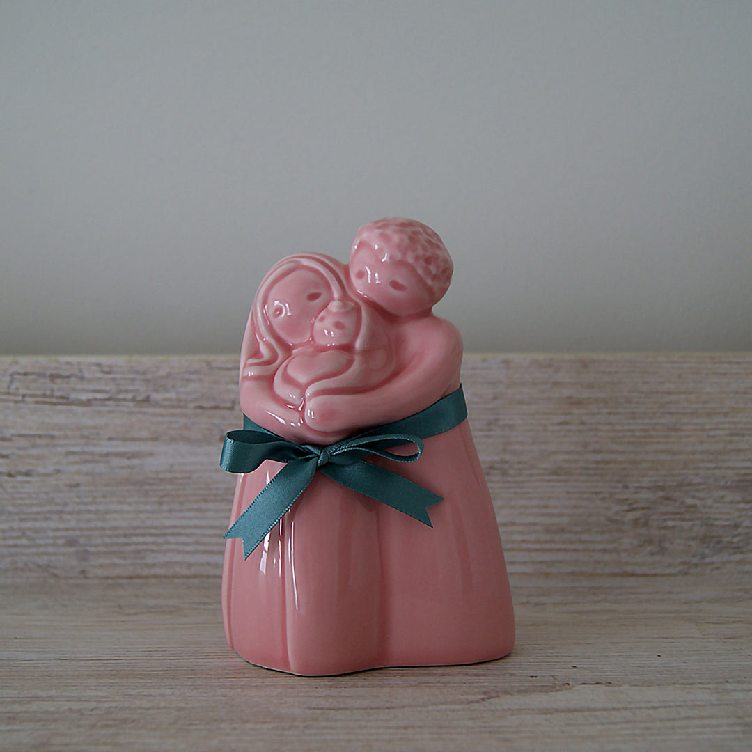 This statue captures a memory we want to touch: the love and tenderness of new parents and the emotions they feel while welcoming a new addition into the family. It’s a figurine that will be remembered and treasured for years.