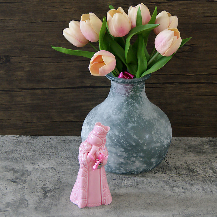 Celebrate your faith with this piece that takes a dear figure and gives it a tender and unique representation.