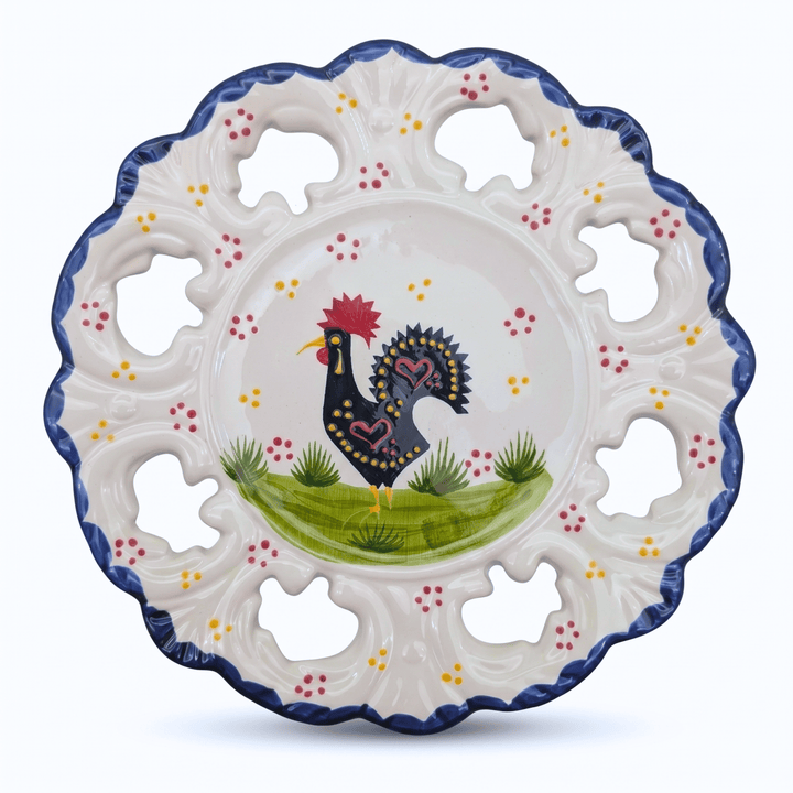 Decorative ceramic plate with a rooster design on a white background
