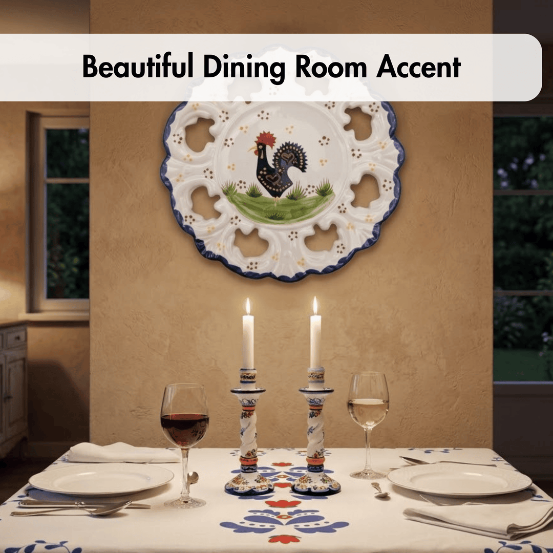 Dining room setting with a decorative plate featuring a rooster on the wall above a set table.