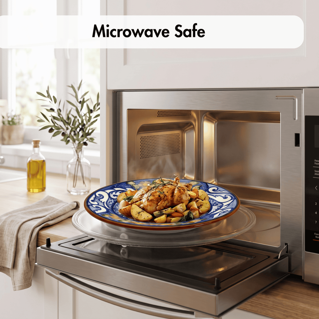 A stainless steel microwave oven with its door open, showing a plate of cooked chicken and vegetables inside. The text &