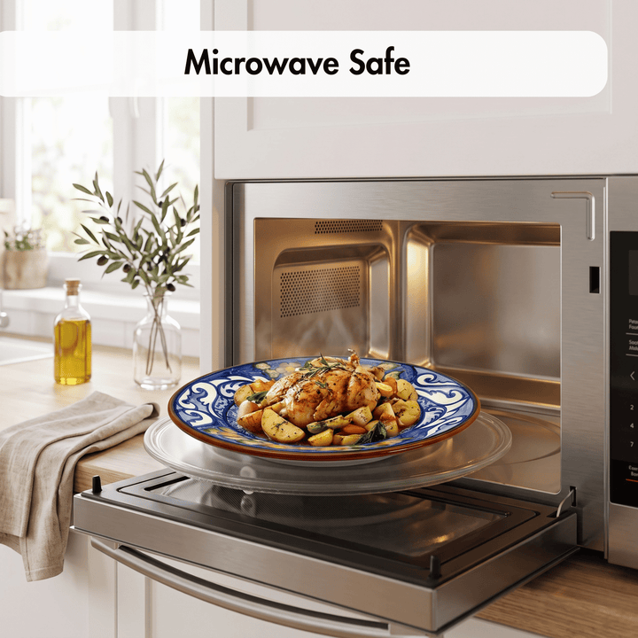 A stainless steel microwave oven with its door open, showing a plate of cooked chicken and vegetables inside. The text &