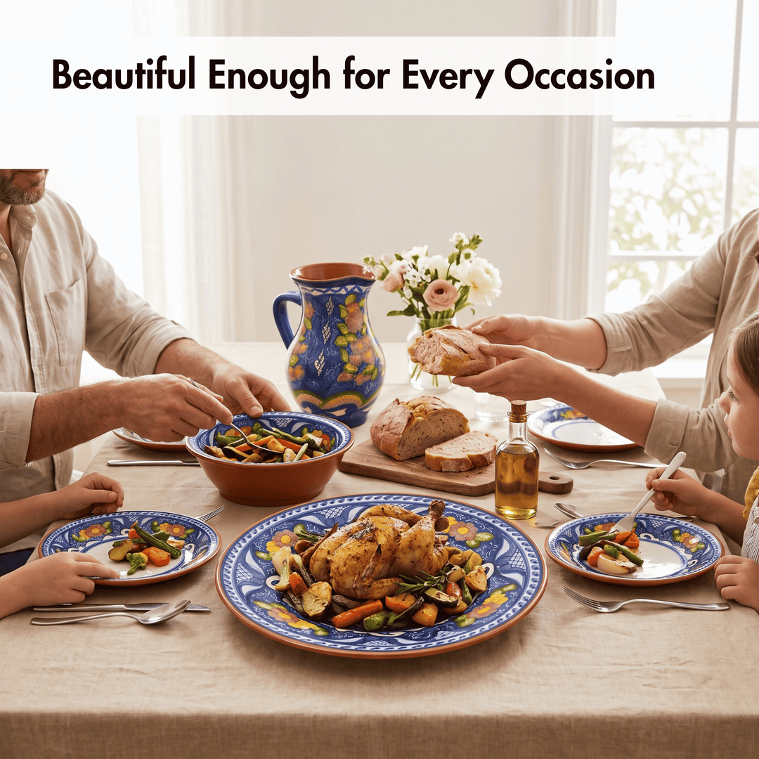 A family dining table set with colorful hand-painted ceramic plates, bowls, and a matching pitcher, with a roasted chicken on the center platter. The scene is warmly lit with a beige tablecloth and a text banner at the top that reads &
