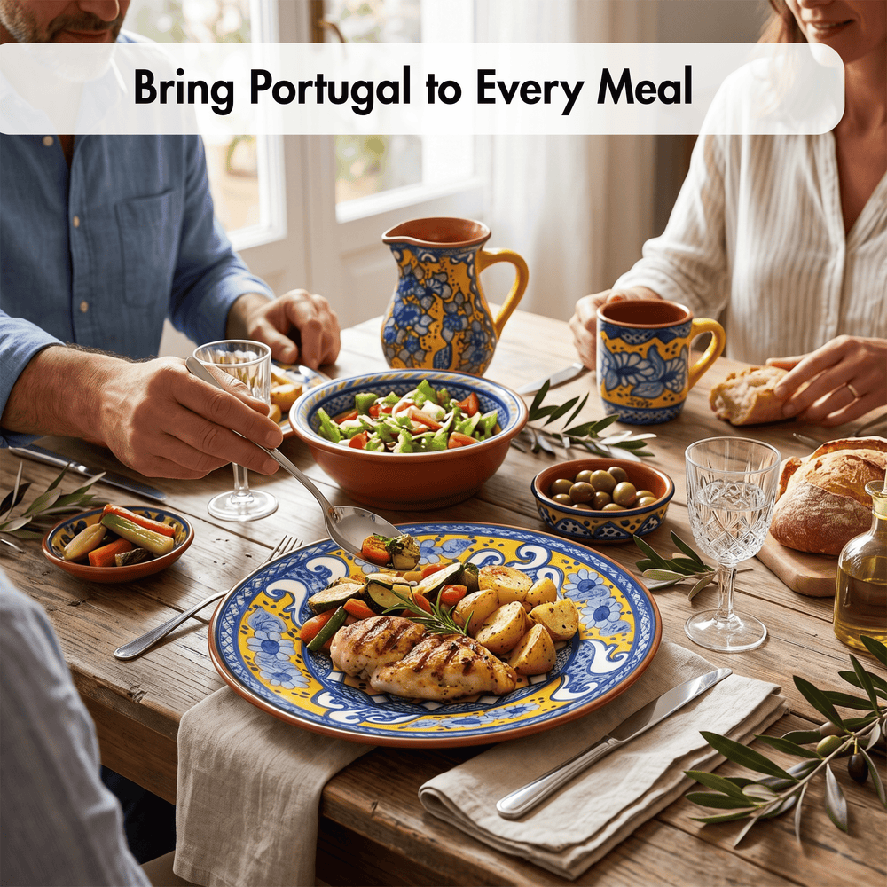 A dining table set for a meal with colorful blue, yellow, and white ceramic tableware, including plates, cups, and a pitcher, alongside food such as chicken, potatoes, salad, olives, and bread. Two people are seated at the table, and a text overlay at the top reads 'Bring Portugal to Every Meal'.