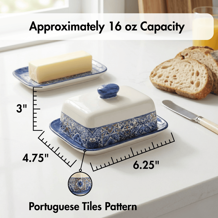 Butter dish with blue and white Portuguese tiles pattern on a table with bread and butter.