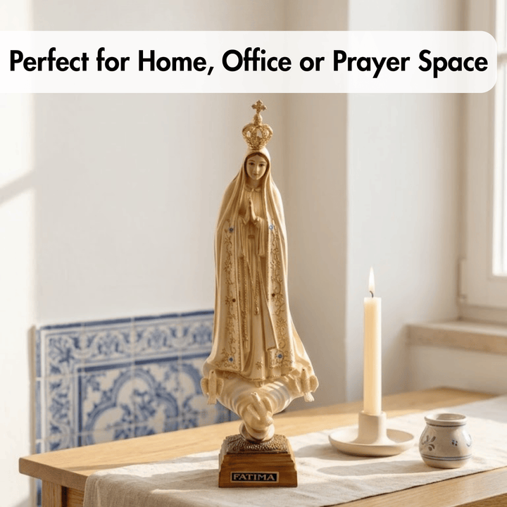 A beige religious statue of Our Lady of Fatima stands on a wooden table in a softly lit home interior, with a white candle, small ceramic dish, and blue-and-white tile panel in the background. Text at the top reads, &