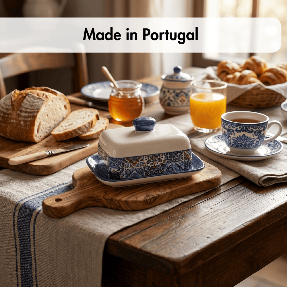 Breakfast scene with Portuguese ceramic items on a wooden table, featuring 'Made in Portugal' text.