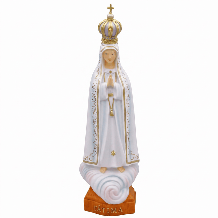 A white and gold statue of Our Lady of Fatima standing on a cloud, with a gold crown and a brown base labeled &