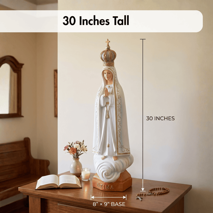 White Our Lady of Fatima statue shown on a wooden table in a home interior, with overlaid dimension labels reading 30 inches tall and 8 x 9 inch base, plus a text banner stating 30 inches tall.