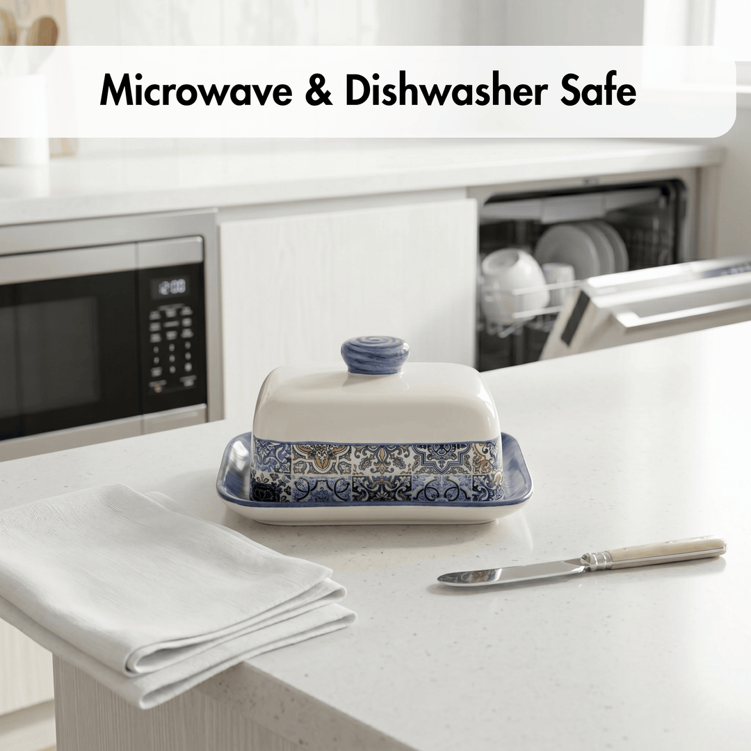 Decorative butter dish on a kitchen counter with microwave and dishwasher safe text above.