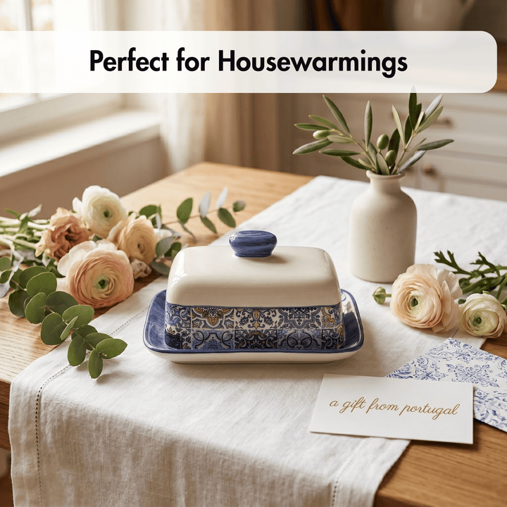 Decorative butter dish with flowers and a card on a table, perfect for housewarmings.