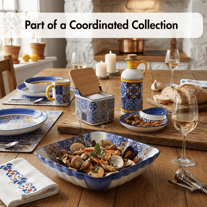 Dining table set with coordinated ceramic dishes and tableware in a kitchen setting.