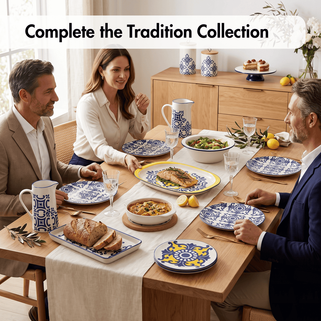 A family of three sits around a wooden dining table decorated with blue and white patterned ceramic plates, pitchers, and bowls of food. The scene is set in a bright, modern kitchen with a wooden sideboard in the background, and a text banner at the top reads &