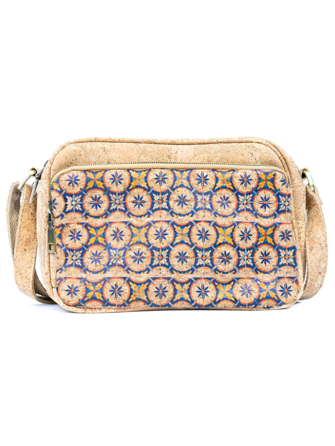Cork crossbody bag with a patterned flap on a white background