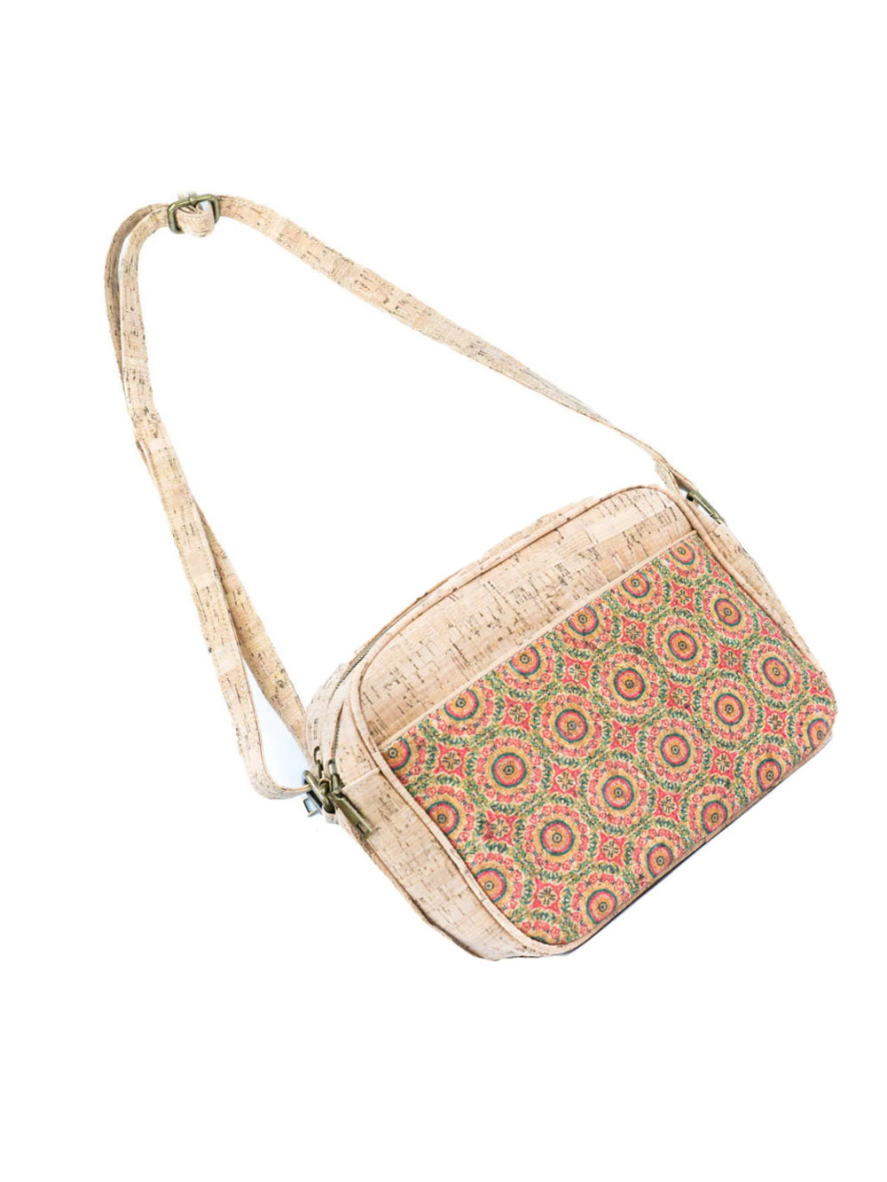 Cork crossbody bag with a patterned flap on a white background