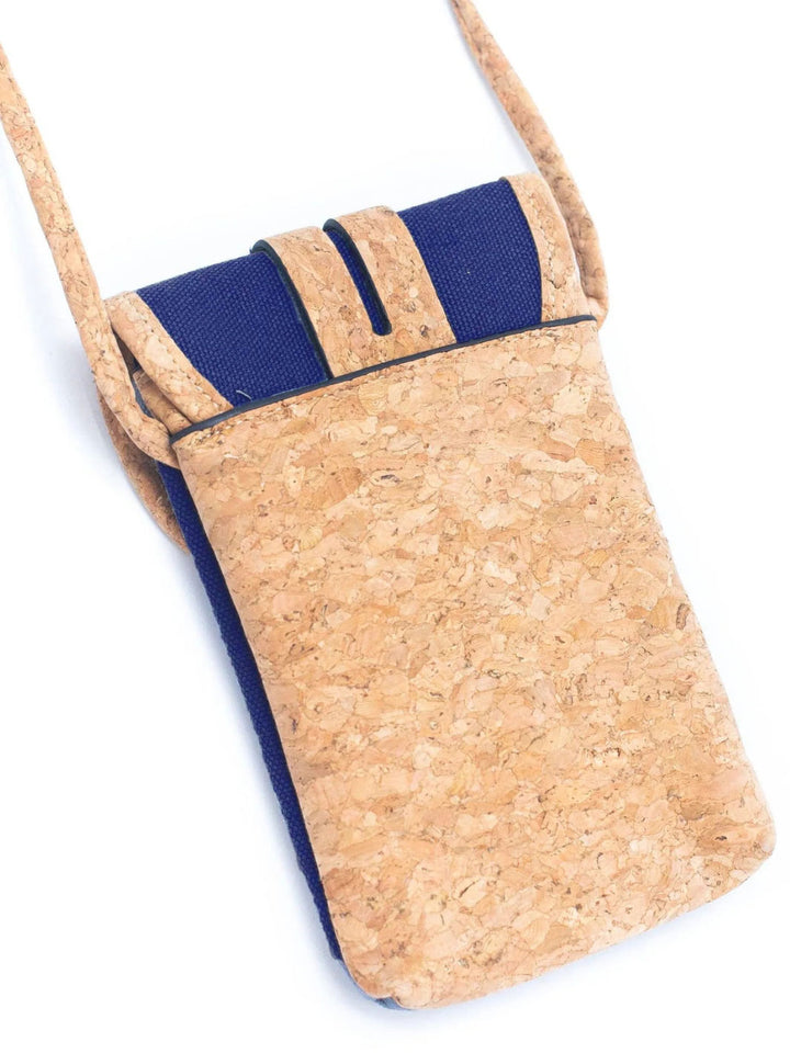 Cork handbag with navy blue accents on a white background