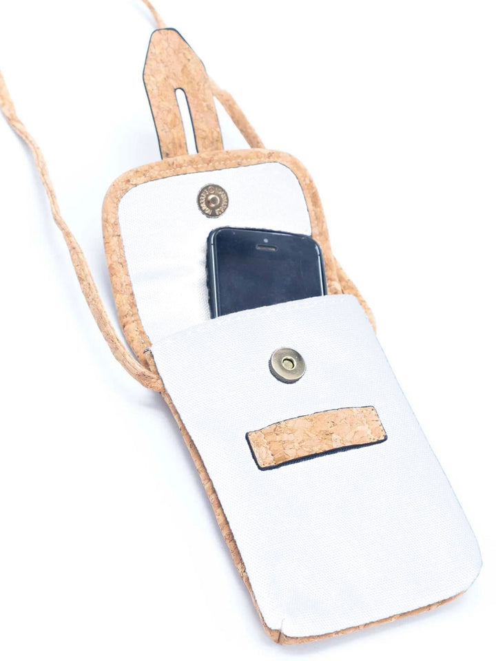 White phone pouch with cork accents on a white background