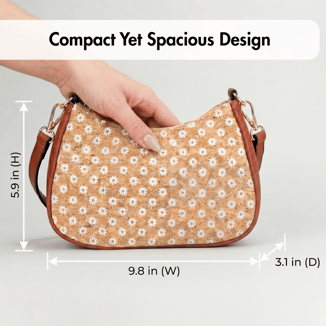 Cork handbag with floral pattern held by a hand, with dimensions displayed on a gray background