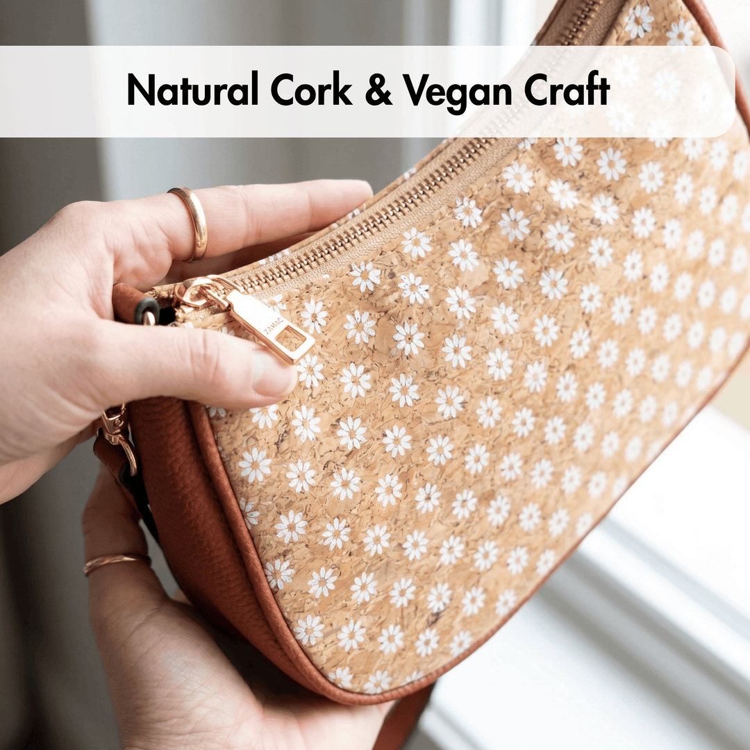 Cork pouch with floral pattern held by a hand, labeled 'Natural Cork & Vegan Craft'.