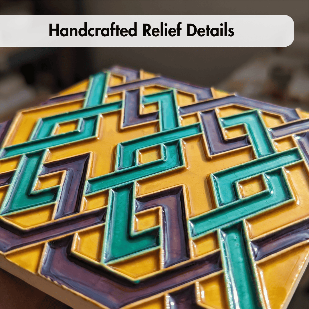A close-up of a handcrafted geometric relief tile with a yellow base and raised teal and purple channels, shown with the text &