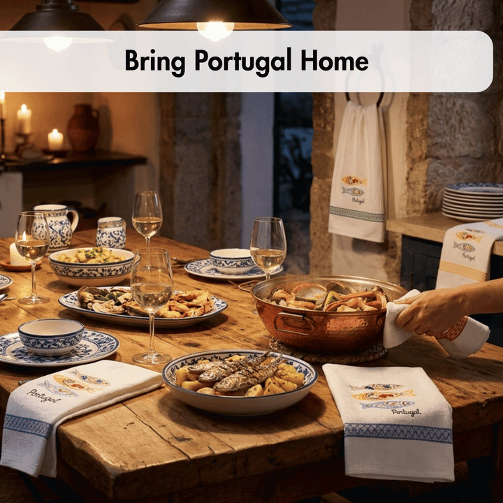 A rustic dining table set with Portuguese tableware, including blue and white patterned plates, cups, folded napkins, and a copper pot being lifted by a person&