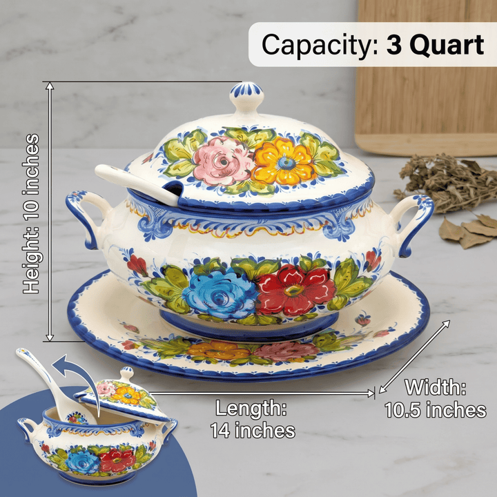 A lidded ceramic soup or stew pot with floral decoration on a matching saucer, shown with overlaid dimension labels and a small inset of the pot on a plate. The product is white with blue trim and multicolored flowers including pink, yellow, blue, red, and green.