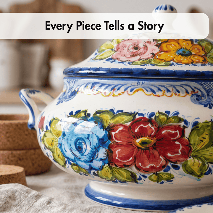 A close-up of a hand-painted ceramic lidded serving pot with floral motifs in blue, red, pink, yellow, and green on a white base, with a text overlay reading &