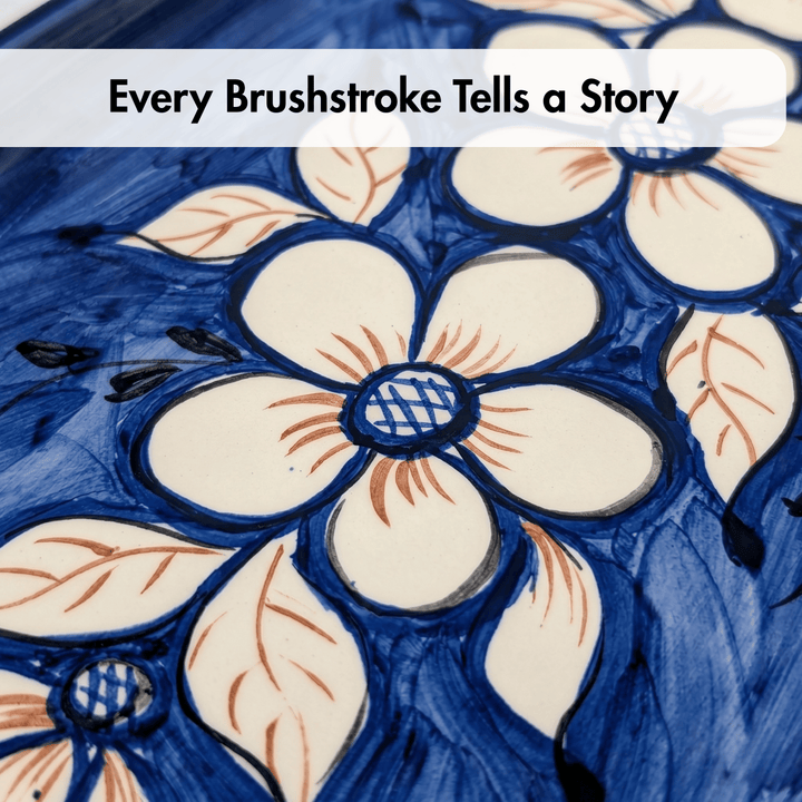 Decorative floral pattern with blue and beige colors, text 'Every Brushstroke Tells a Story' above.