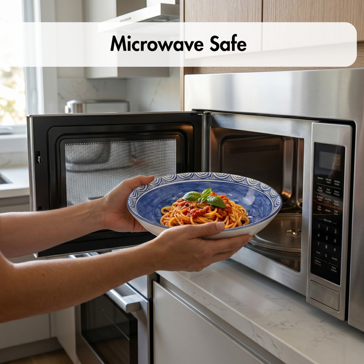 Person holding a bowl of pasta in front of an open microwave with 'Microwave Safe' text above.