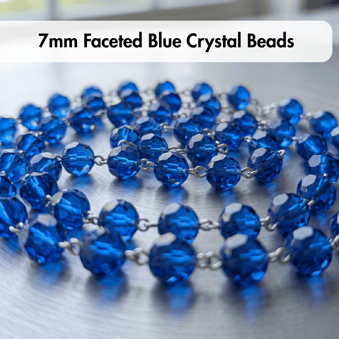 7mm Faceted Blue Crystal Beads on a white background
