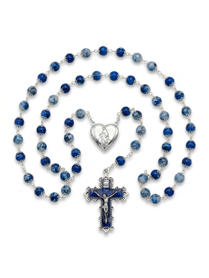 Blue rosary with a cross and heart pendant on a white background