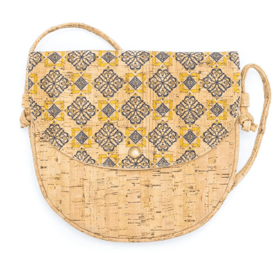 Cork handbag with a patterned flap on a white background