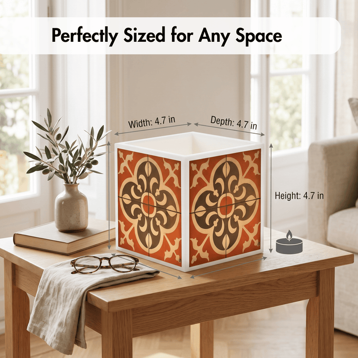 A decorative square box with a warm orange, brown, and beige floral tile pattern sits on a wooden table in a bright living room. White measurement arrows and text overlay the box, showing width, depth, and height as 4.