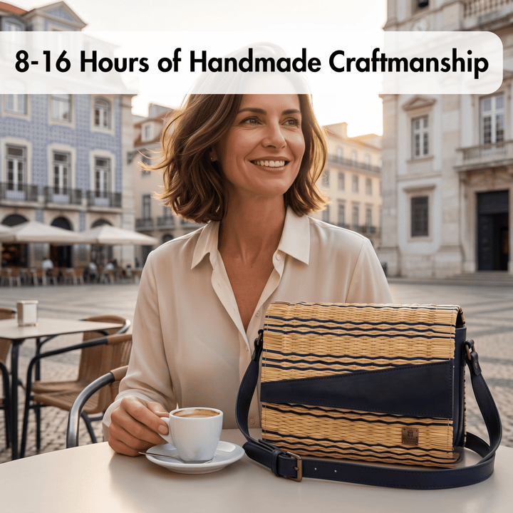 A woman sitting at an outdoor cafe table with a cup of coffee next to a woven shoulder bag with navy blue stripes. A text overlay at the top reads &