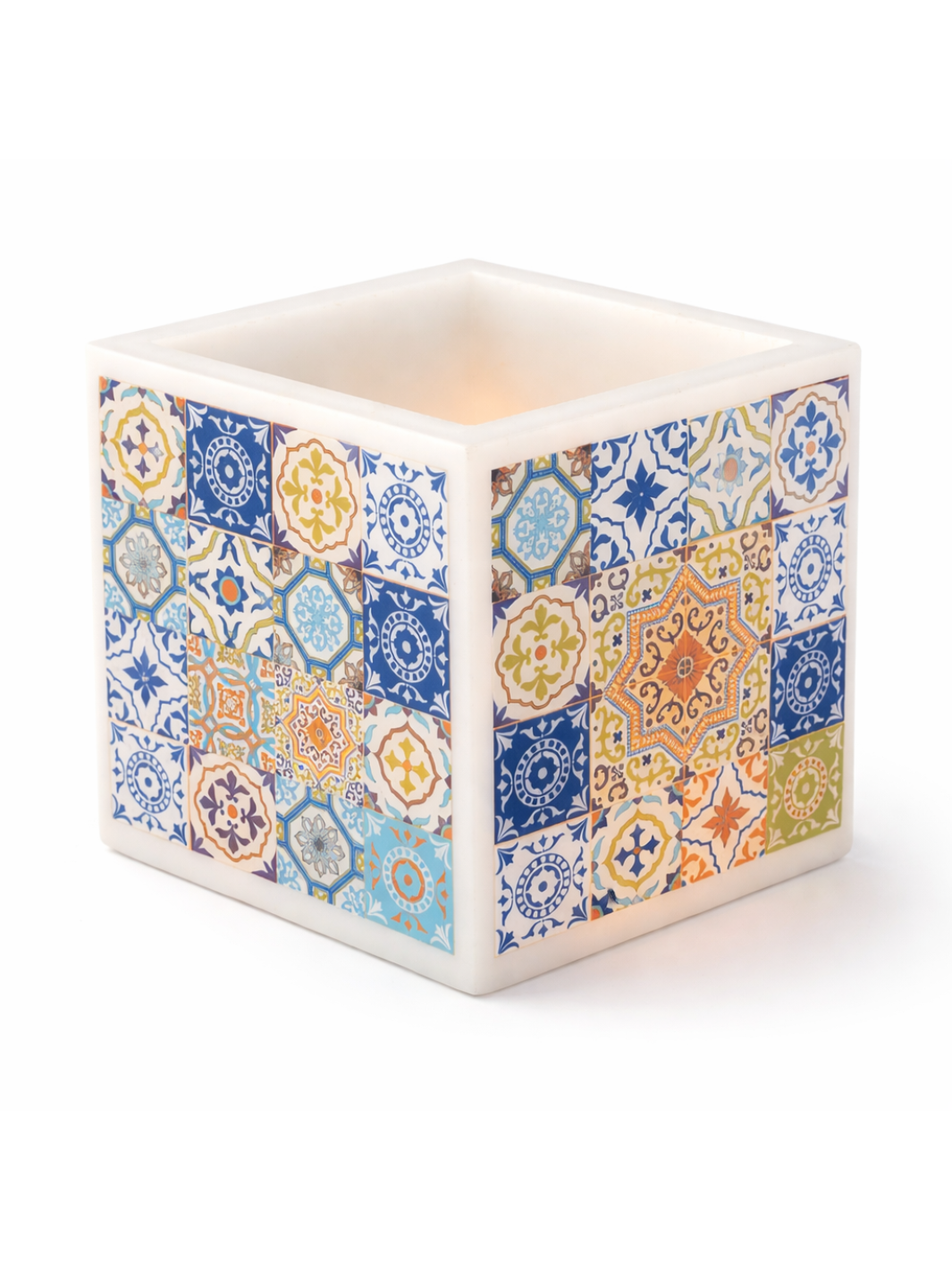 Decorative candle holder with colorful mosaic pattern on a white background