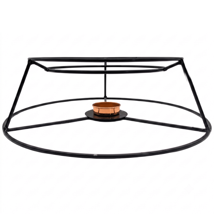 A black metal candle holder frame with a circular base and top ring, holding a small copper-colored candle in the center, shown on a plain white background.