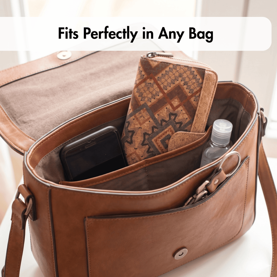 Brown leather bag with phone, cork wallet, and water bottle inside, text 'Fits Perfectly in Any Bag'.