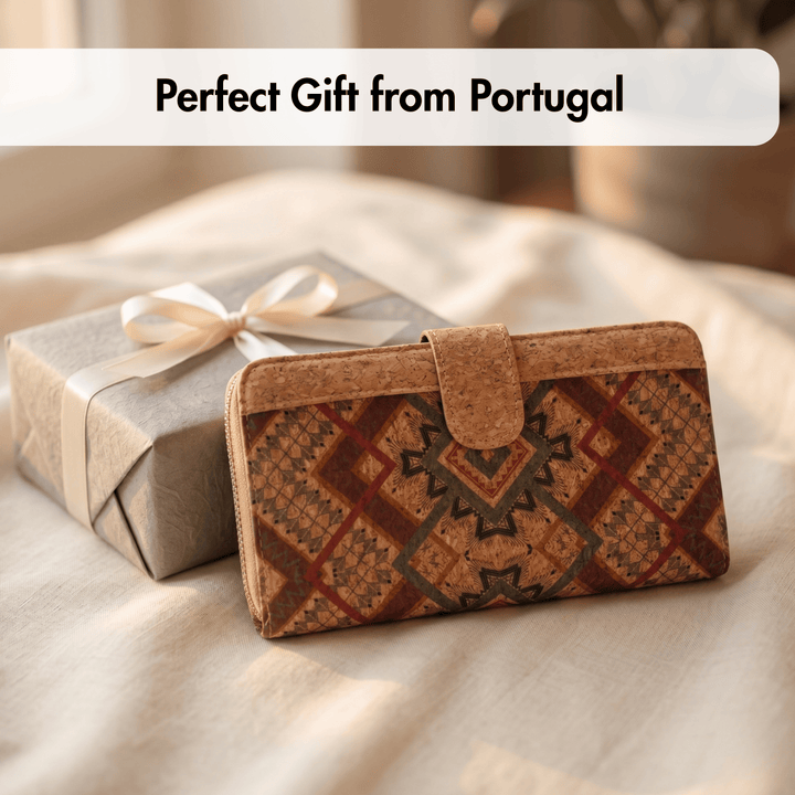 Patterned wallet and wrapped gift on a soft surface with 'Perfect Gift from Portugal' text.