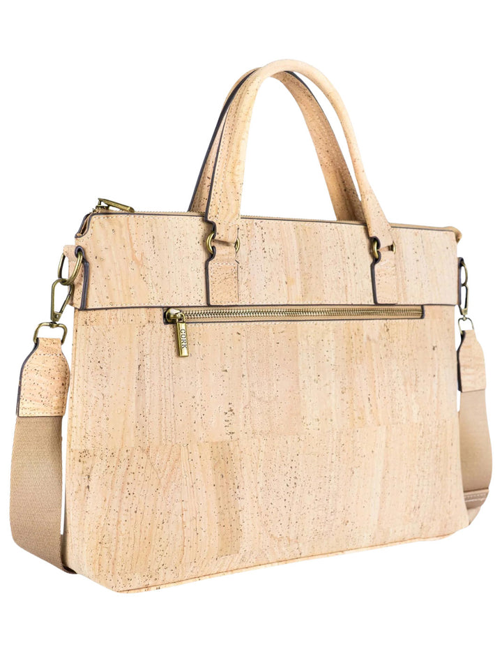 Beige cork handbag with gold zipper on a white background