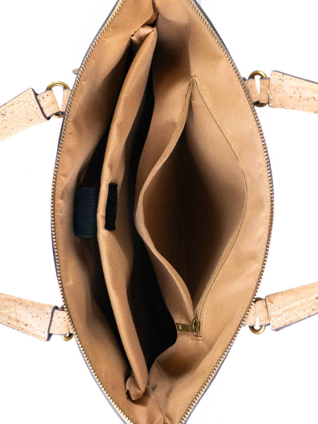 Tan leather handbag with a visible brand logo on a white background