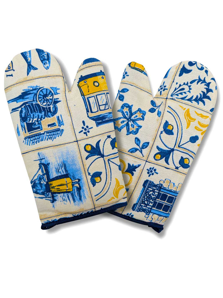 Pair of oven mitts with decorative blue and yellow patterns on a white background