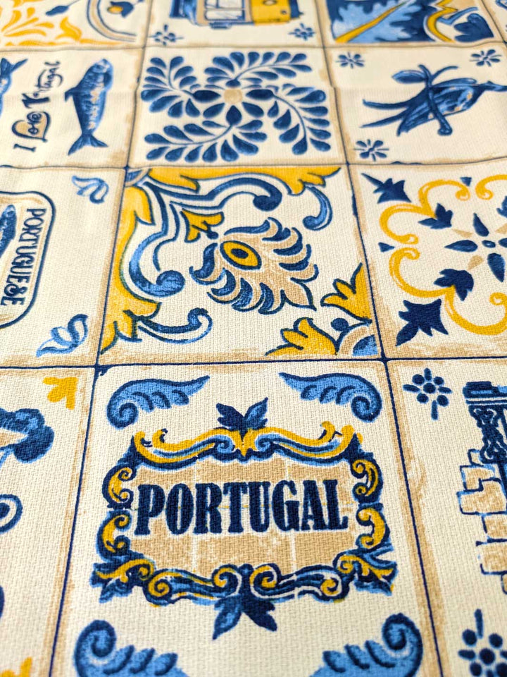Decorative tiles with Portuguese design featuring the word 'Portugal'.
